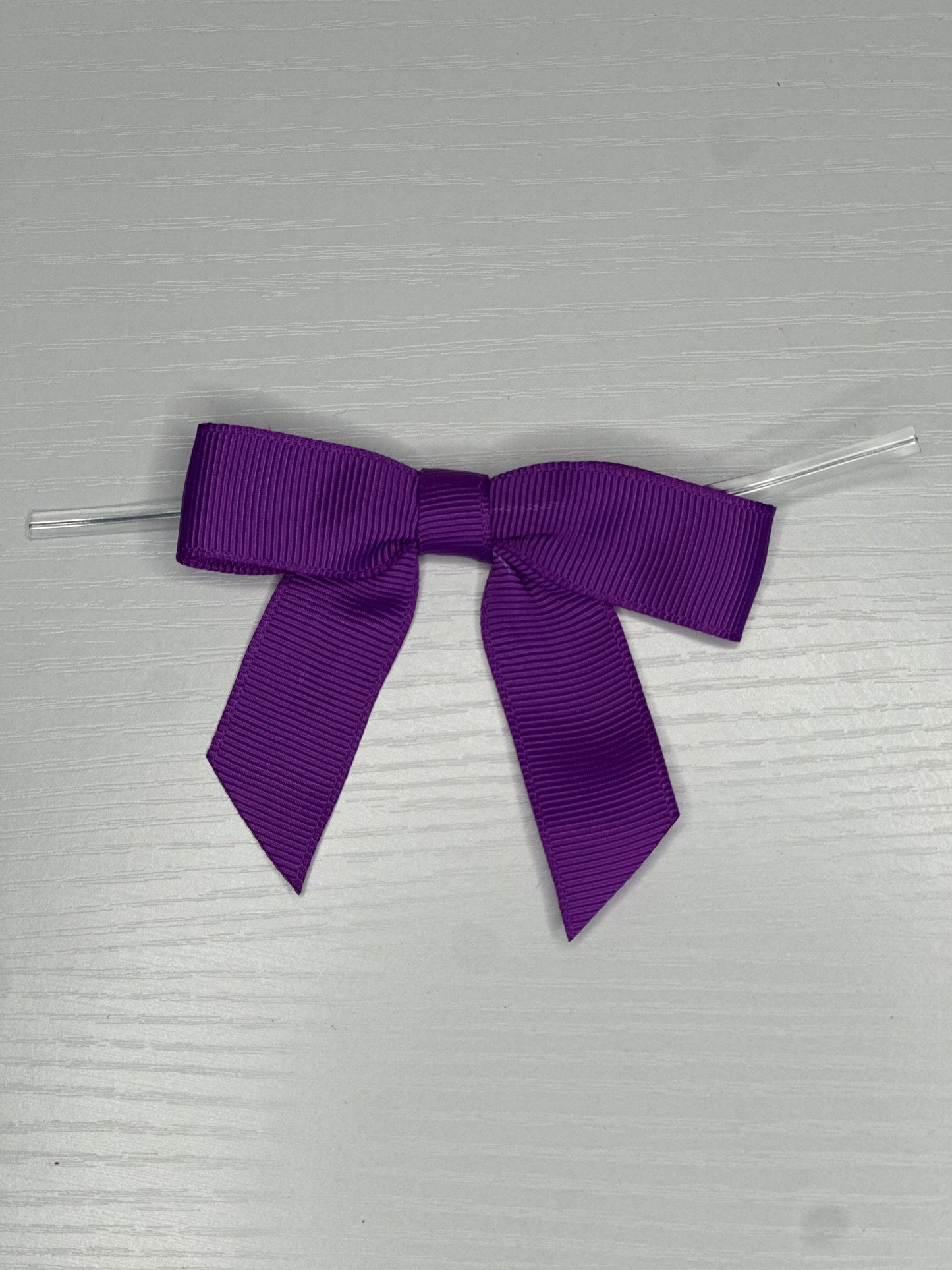 Bow with twist tie